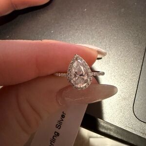 Moissanite Pear w/ Halo .98 CTW Size 5